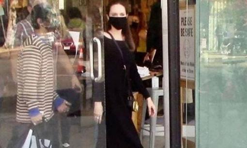 Con trai nuôi gốc Việt ra dáng khi hộ tống Angelina Jolie xuống phố 