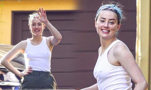 Amber Heard vô tư 'thả rông' vòng một, cười tươi như hoa sau khi Johnny Depp thua kiện