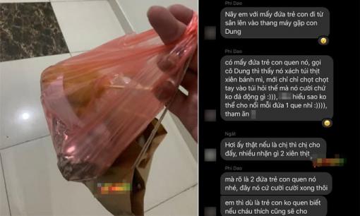 Cô gái bị hàng xóm lập nhóm kín nói xấu vì không cho trẻ con thức ăn đang cầm trên tay