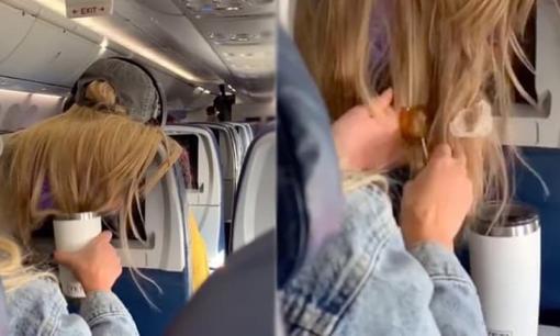 Đi chung chuyến bay, bị người đằng trước xõa tóc che màn hình, cô gái bôi kẹo cao su lên tóc để trả đũa