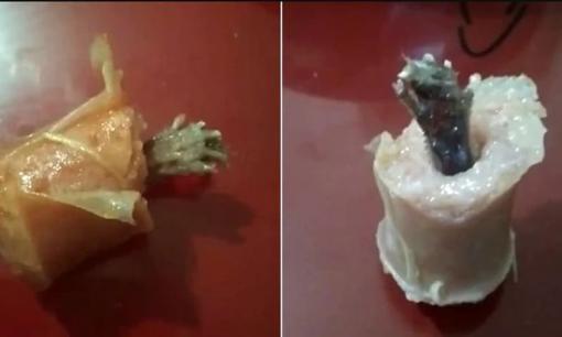 Ăn ngon lành gần hết cây xúc xích thì phát hiện chân chuột, khách đòi bồi thường 1,7 tỷ đồng