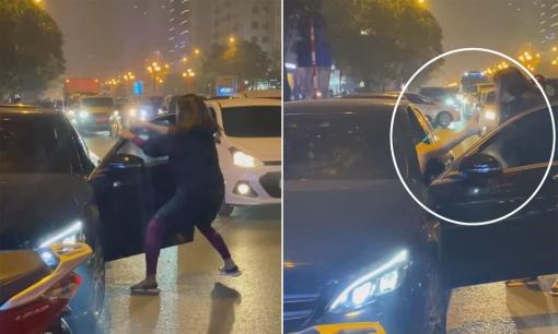 Người phụ nữ chặn xe Mercedes giữa đường phố Hà Nội để đánh ghen, cú đá của tiểu tam trên xe gây chú ý