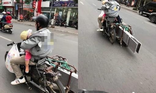 Hình ảnh ông bố chở đồ cồng kềnh trên phố, một tay ôm con trước ngực khiến ai nhìn cũng thương