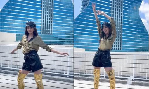 Khánh Vân lên đồ như chiến binh, trổ tài pose hình trước khách sạn cây đàn nổi tiếng