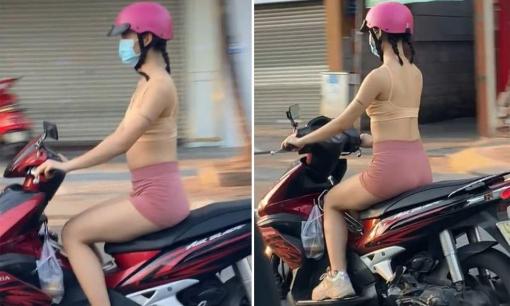 Cô gái diện đồ tập thể dục mát mẻ lái xe chạy bon bon trên đường gây tranh cãi