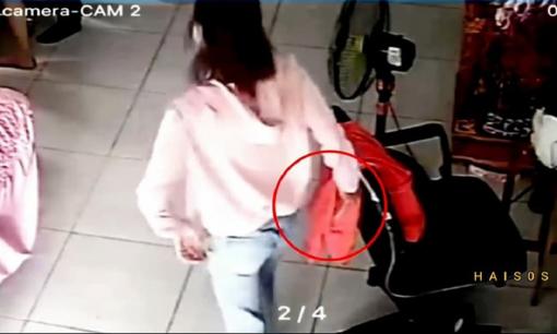 Vờ hỏi làm tóc, 'nữ quái' nhanh tay móc ví trong túi áo của khách ở tiệm lấy đi số tiền lớn