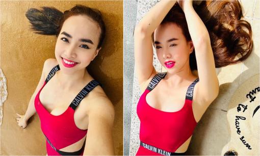 'Gái 2 con' Đinh Ngọc Diệp diện đồ bơi tạo dáng gợi cảm trước biển, U40 mà body vẫn quá xịn xò