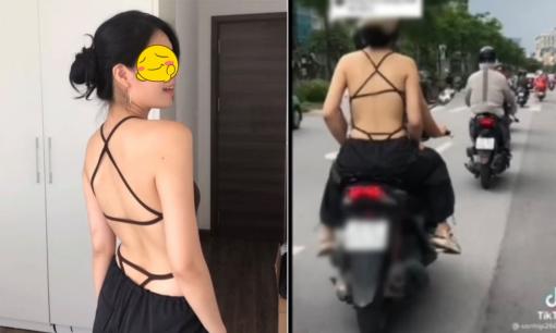 Cô gái gây 'bão mạng' vì mặc trang phục hở lưng ra đường, phản ứng 'bá đạo' khi bị quay lén 