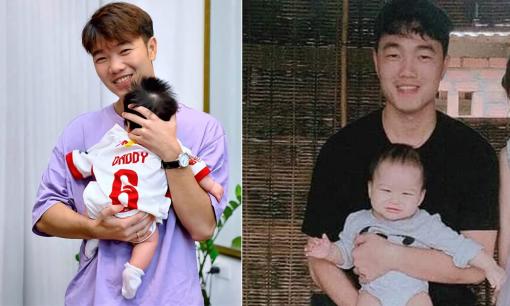 Hình ảnh tiền vệ Lương Xuân Trường bế em bé, phải chăng đã chịu để lộ mặt con? 