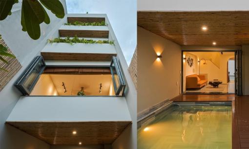 Thiết kế nhà 4 tầng có bể bơi gần phòng khách tạo không gian mát mẻ, sân thượng ngập cây xanh