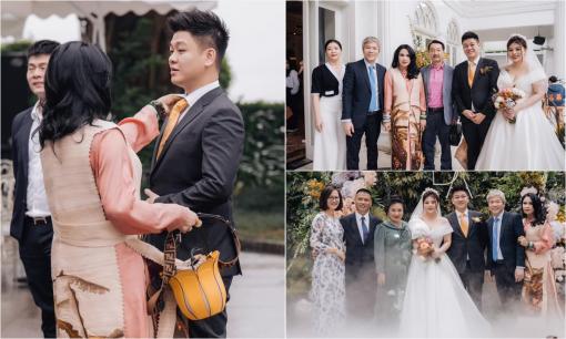 Diva Thanh Lam nắm chặt tay bác sĩ Tiến Hùng, cử chỉ cực thân tình dành cho con trai riêng của chồng trong ngày trọng đại