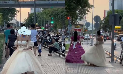 Hai 'cô dâu' xách váy đi ngoài đường không có chú rể bên cạnh gây chú ý, sự thật là gì?