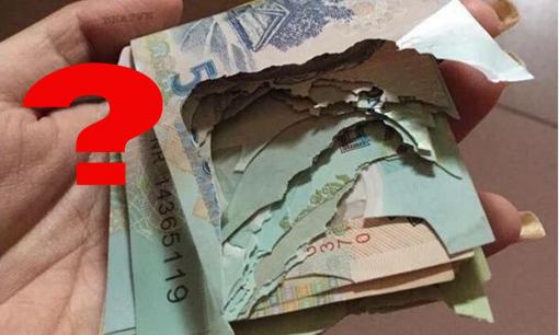 Tiền khi bị rách có đổi được không, có bị mất phí không?