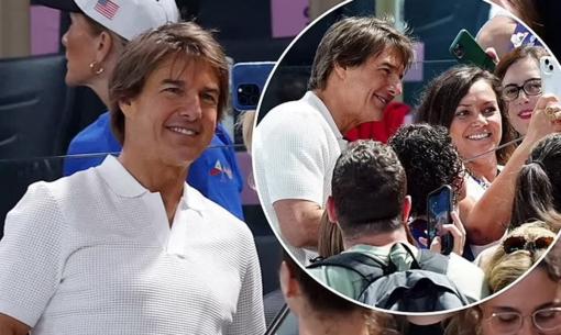 Tom Cruise bị fans bao vây chụp ảnh khi đang đứng tạo dáng tại Thế vận hội Olympic Paris 2024
