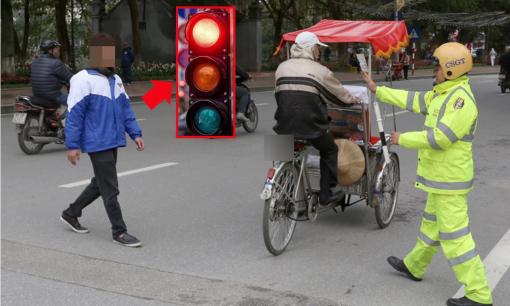 Đi bộ vượt đèn đỏ có bị phạt tiền hay không? 
