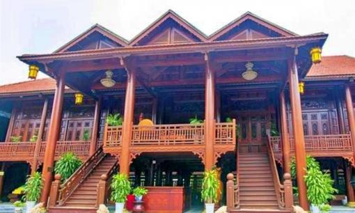 Ngôi nhà sàn gỗ lim 'khủng' nhất Việt Nam: Chi phí 200 tỷ, thuê hơn 10.000 công thợ, xây trong vòng 4 năm 