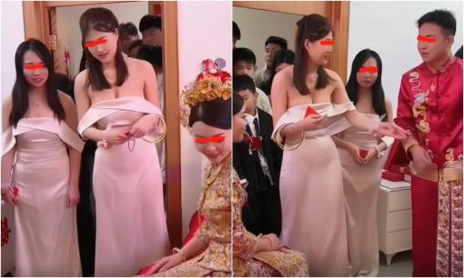 Phù dâu 'cướp sóng' cô dâu khi mặc váy ống lộ cả bầu ngực, còn thường xuyên tương tác với chủ rể 