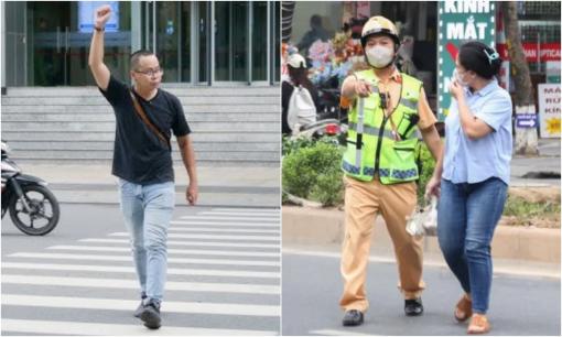 Có bắt buộc đi bộ sang đường phải vẫy tay báo hiệu trong mọi trường hợp?