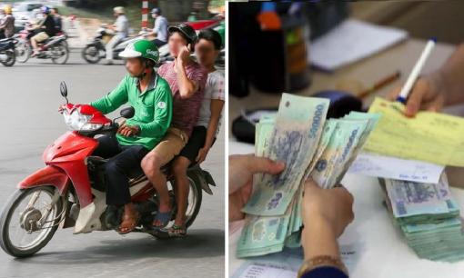 Xe máy 'kẹp' 3 bị xử phạt bao nhiêu tiền theo quy định mới nhất? Trường hợp nào thì người điều khiển xe máy chở 3 mà không bị phạt?