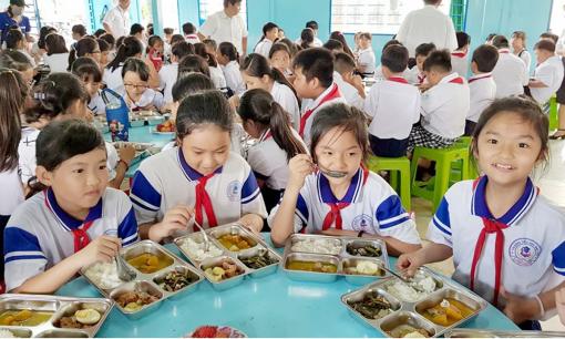 Học sinh tiểu học tại Hà Nội được nhận mức hỗ trợ bữa ăn bán trú cụ thể là bao nhiêu tiền?