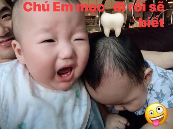 Trương Nam Thành khoẻ ảnh quý tử tròn 9 tháng tuổi đã mọc răng với biểu cảm cực yêu