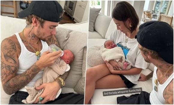 View - Justin Bieber và vợ Hailey bồng bế, chăm bẵm một bé gái mới sinh, nhìn như cặp cha mẹ đích thực