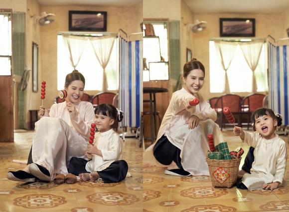View - Thiên An tung ảnh Tết bên con gái cưng: Ái nữ cực đáng yêu trong lần đầu diện áo dài, loạt biểu cảm chuẩn 'thánh meme nhí' 