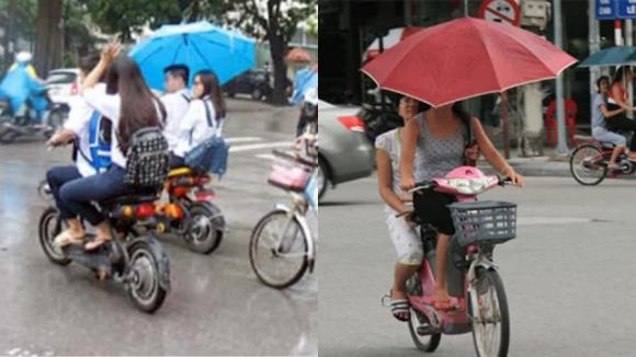 Nghị định 168, mức phạt cầm ô khi đi xe máy