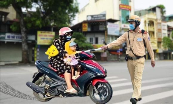 luật giao thông, vi phạm giao thông, cha mẹ chở con, kiến thức