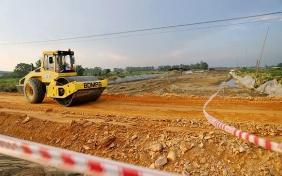 Thu hồi đất, tiền đền bù, luật đất đai