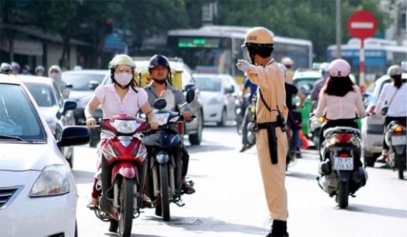 xe máy phải bắt buộc giảm tốc độ, trường hợp phải dừng xe, luật giao thông