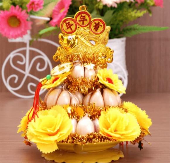 de-ban-tho-than-tai-khong-bao-gio-mat-loc-gia-chu-phai-lam-ngay-viec-nay (1).jpg 0 bàn thờ Thần tài, Phong thủy, đặt tỏi trên bàn thờ thần tài